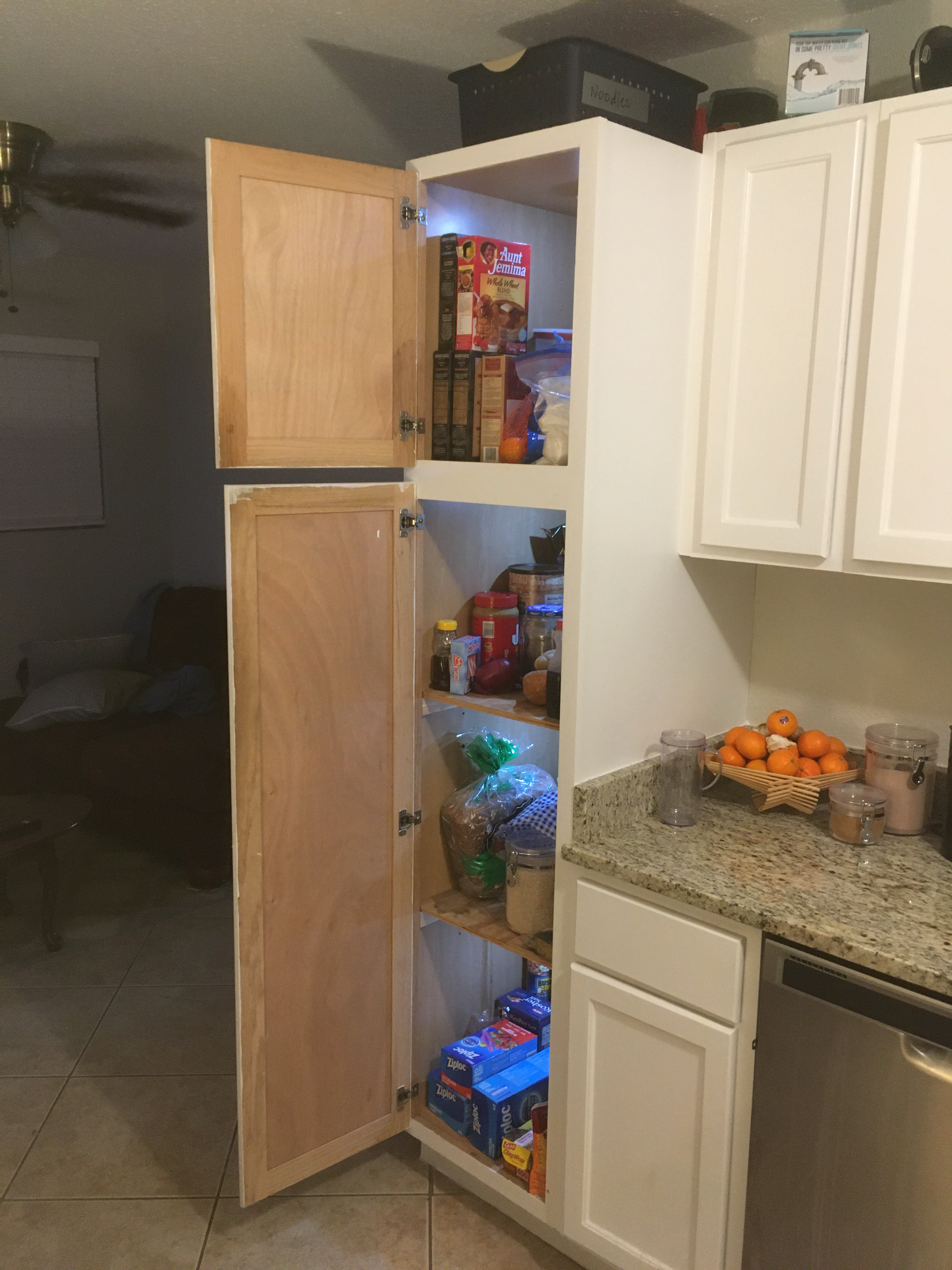 a pantry with led lights shining bright light out of it